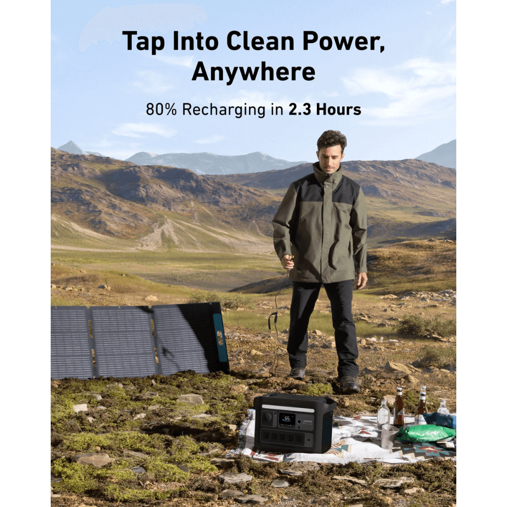 User standing next to Anker SOLIX C800X Solar Generator and solar panel in nature, promoting clean power and fast recharging.